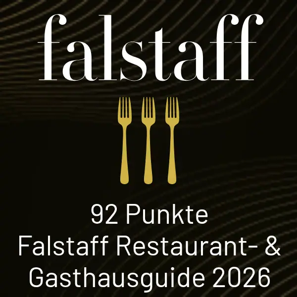 Restaurantführerkarte mit schwarzem Hintergrund und weißem Text: falstaff 91 Punkte Restaurant Guide
