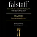 Menu nero e oro con testo e design elegante.